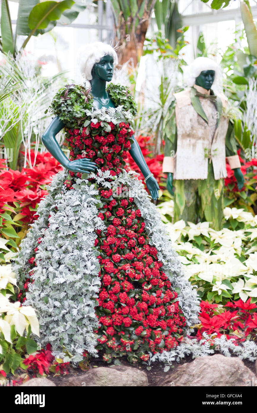 Statue wearing clothes made of colorful Christmas flowers displayed at  Allan Gardens, Toronto, Ontario, Canadacolor image, canon Stock Photo -  Alamy