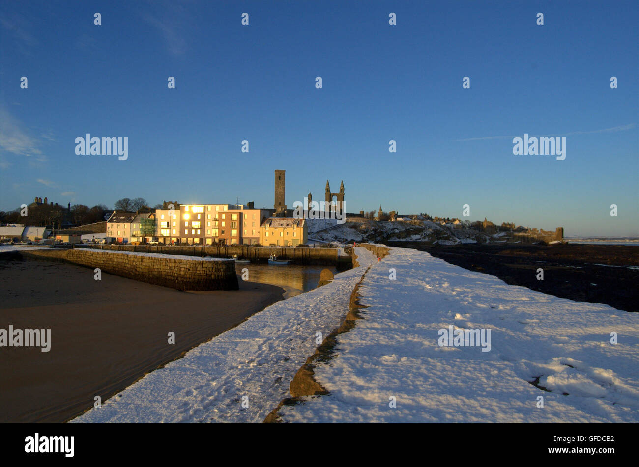 View of St Andrews from the pier in the snow, St Andrews, Fife, Scotland Stock Photo