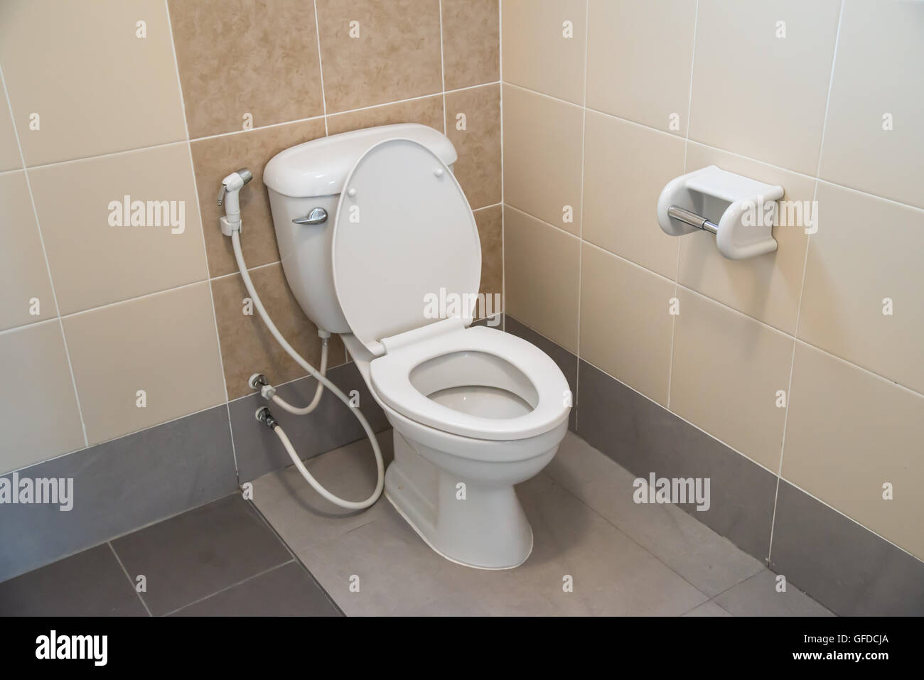 White toilet bowl in a bathroom Stock Photo - Alamy