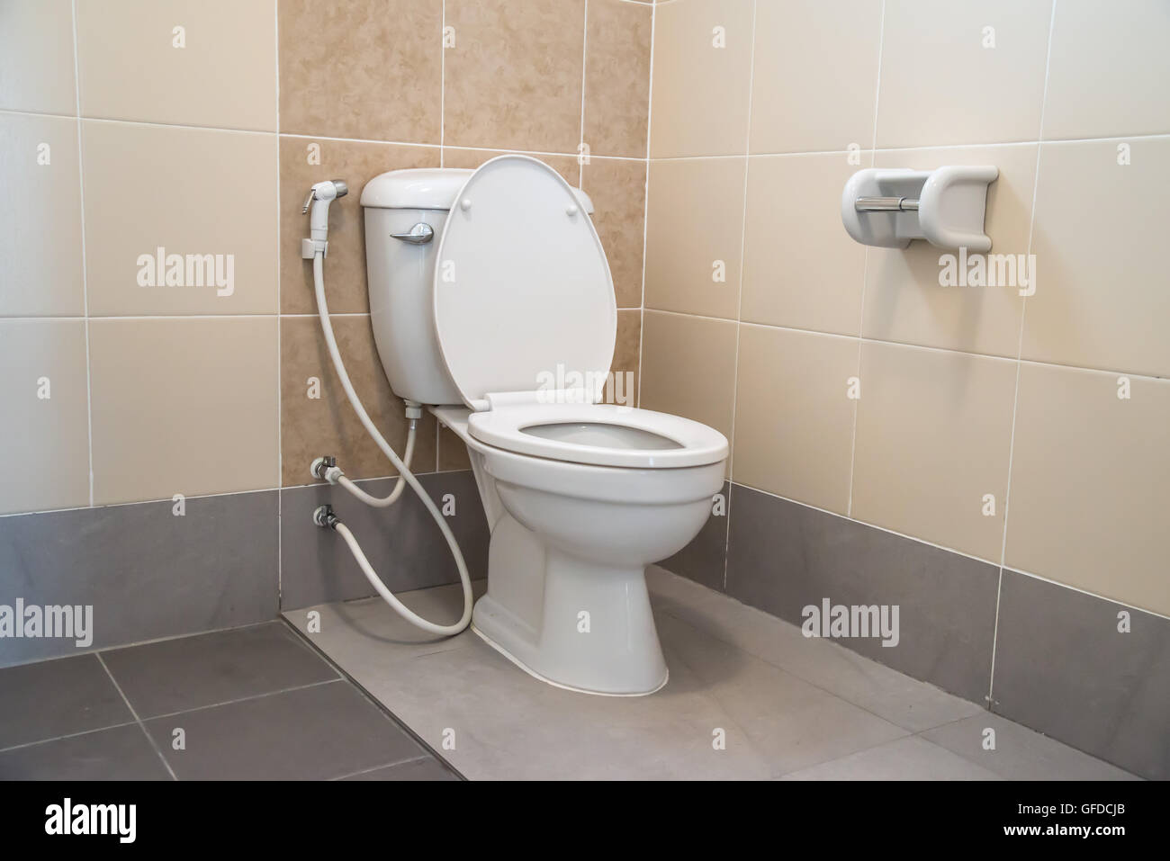 White toilet bowl in a bathroom Stock Photo - Alamy