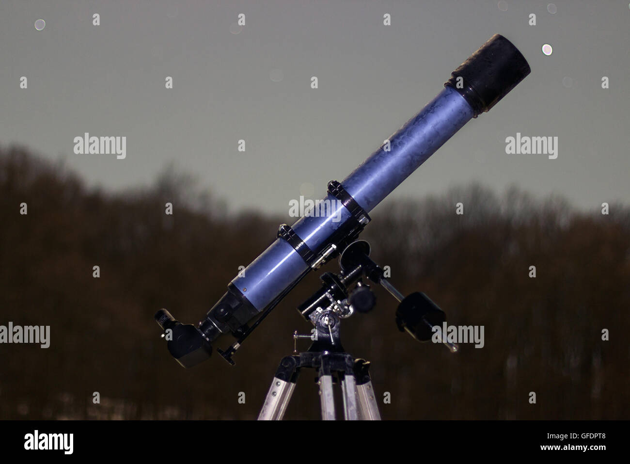 Telescope in night sky Winter edition frozen telescope Refractor