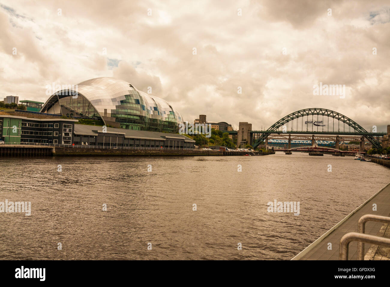 A view of the Quayside at Gateshead and Newcastle featuring the Sage and Tyne bridges Stock Photo