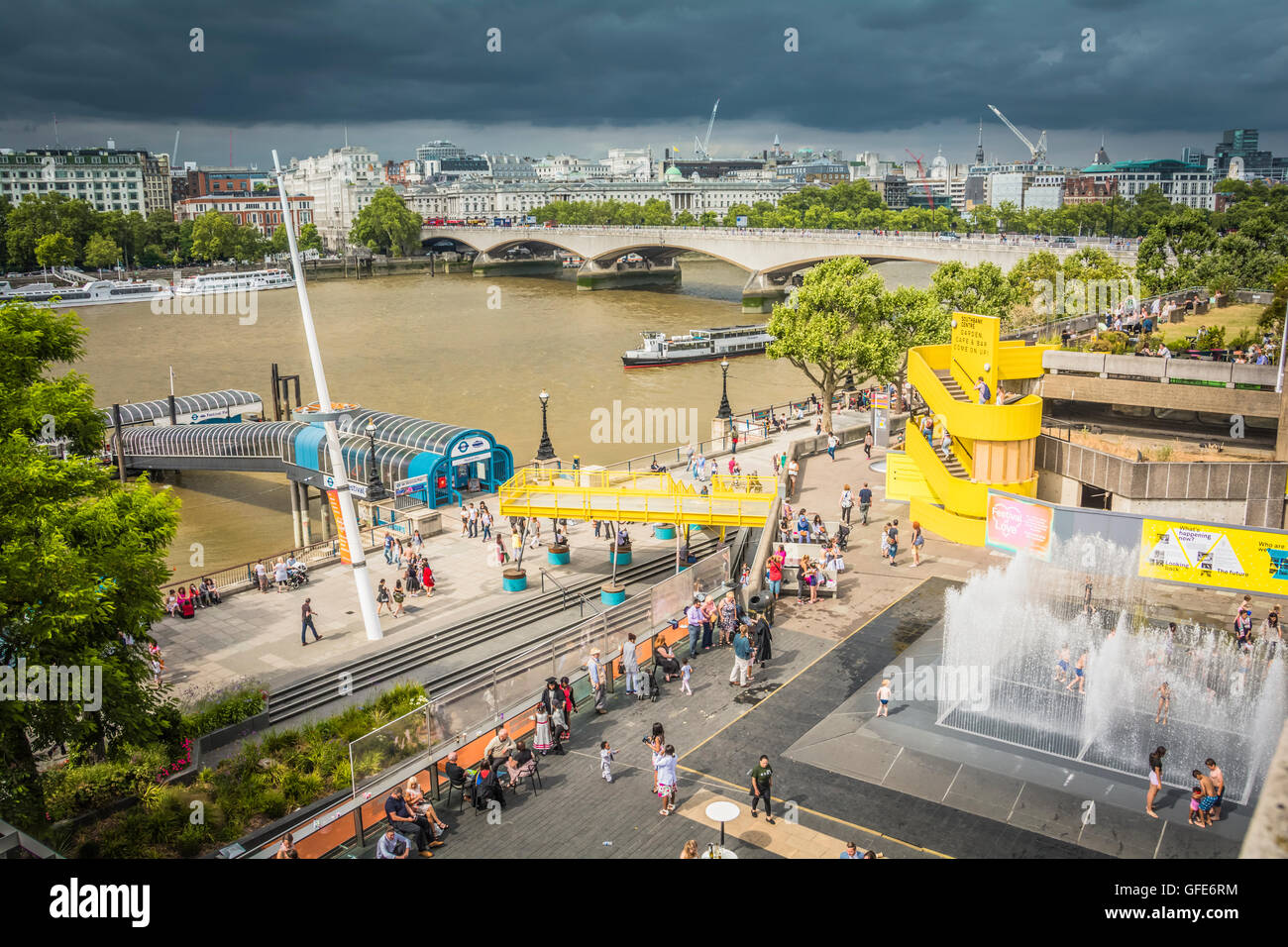 Children playing in the Appearing Rooms fountains on the Southbank, London, UK Stock Photo