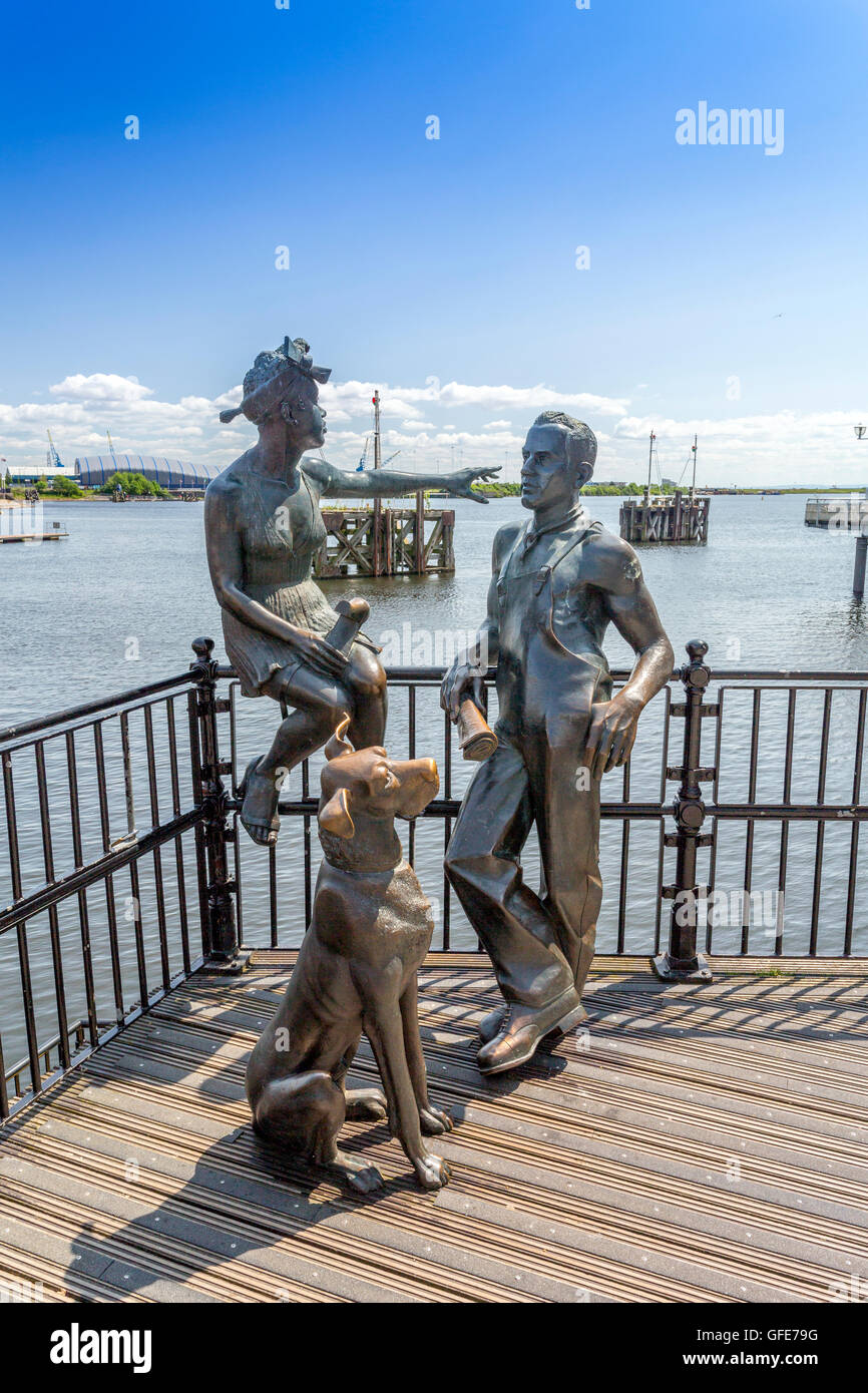 'People Like Us' bronze artwork by John Clinch (1993) at mermaid Quay, Cardiff, South Glamorgan, Wales, UK Stock Photo