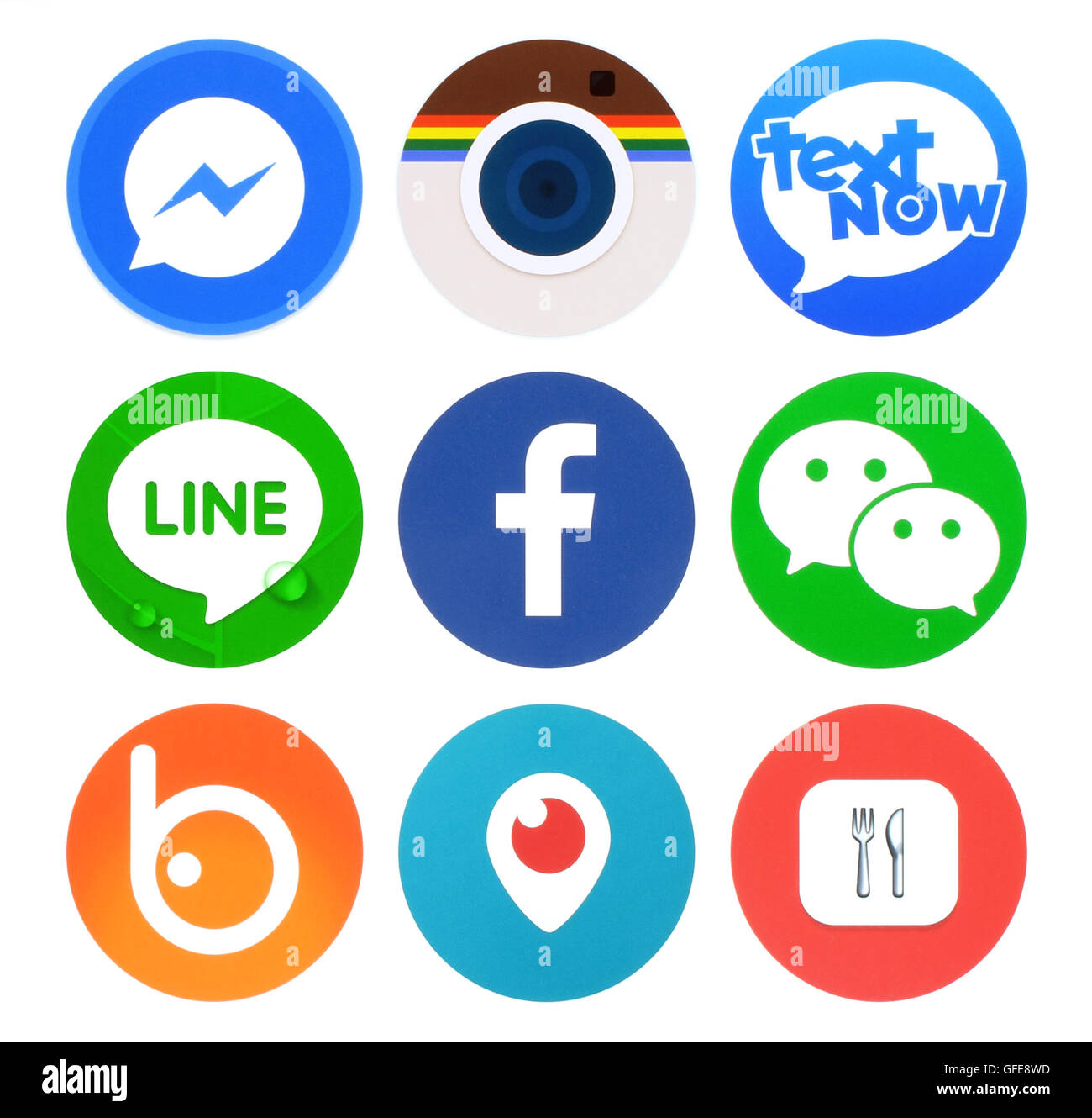 Kiev, Ukraine - April 22, 2016: Collection of popular round social networking icons, printed on paper: Facebook, Messenger, etc. Stock Photo