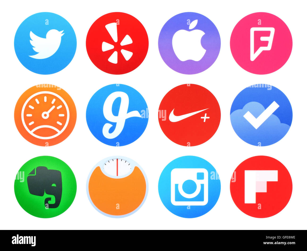 Kiev, Ukraine - April 28, 2016: Collection of popular Apple watch application icons printed on paper: Twitter, etc. Stock Photo