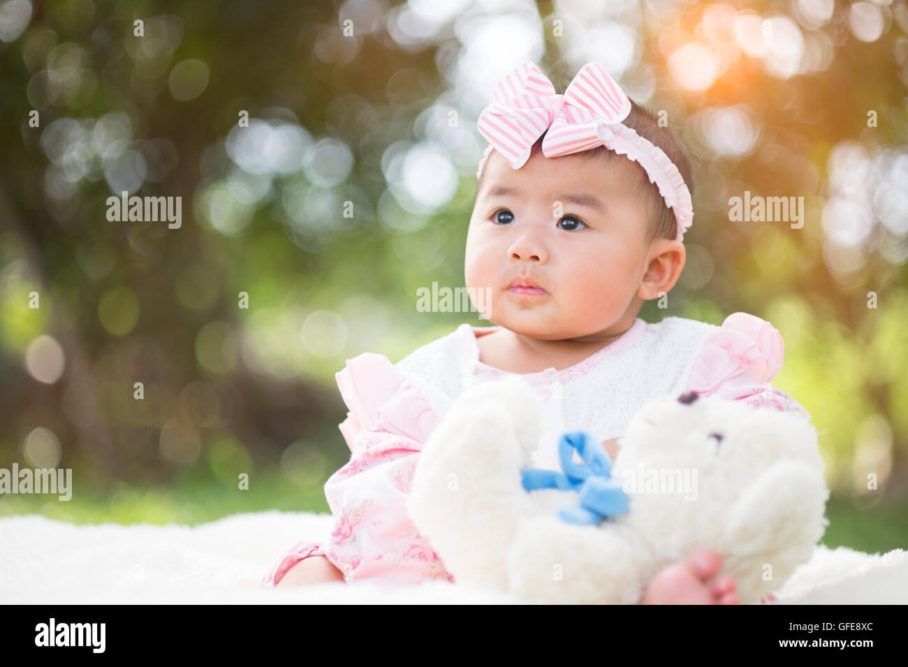 happy smiling cute little girl child outdoors in summer day Stock Photo
