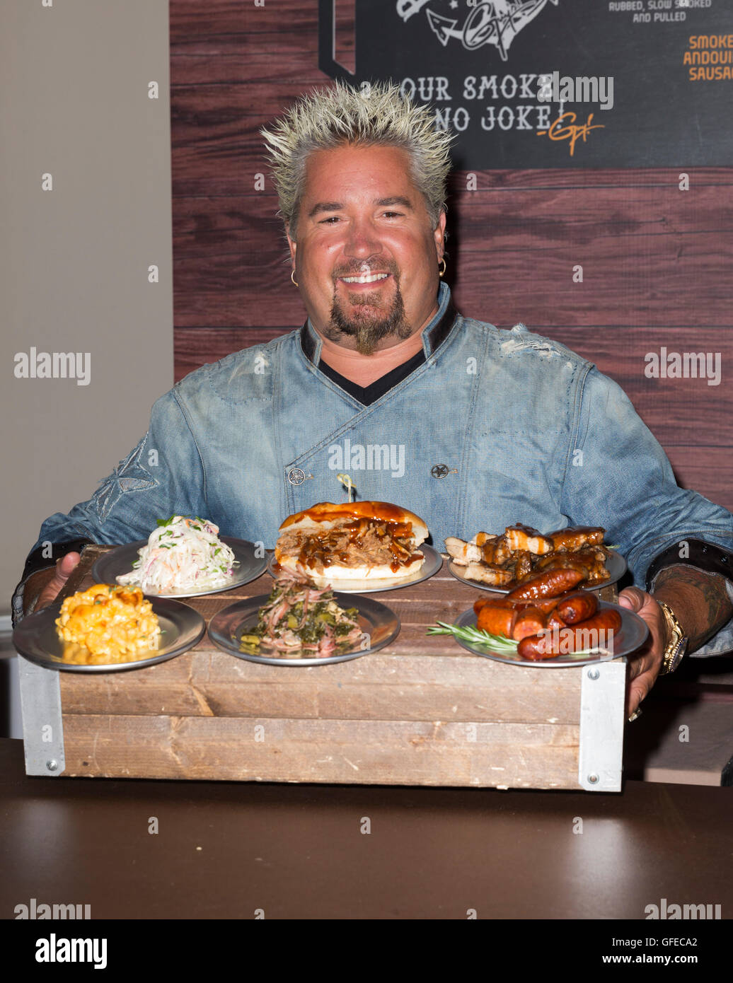 New York, United States. 27th July, 2016. Chef Guy Fieri presented designed for Carnival cruises Open-Air Barbeque Eatery at Beer-B-Que on roof garden 620 Loft and Garden. © Lev Radin/Pacific Press/Alamy Live News Stock Photo
