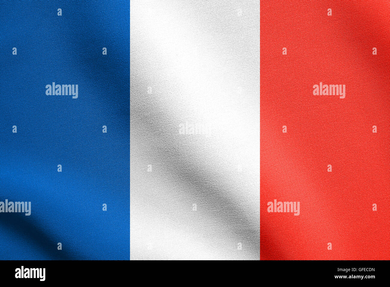 Flag of France waving in the wind with detailed fabric texture. French flag. Stock Photo