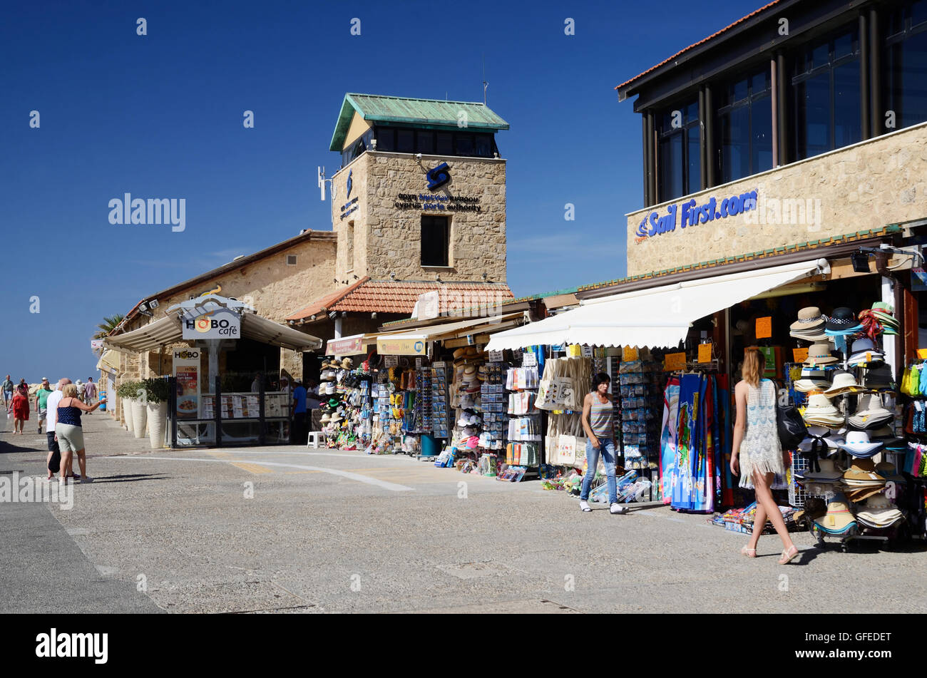 PAPHOS, CYPRUS - APRIL 20, 2016:Unidentified tourists shopping and walking at New Paphos harbour in Paphos,Cyprus on April, 20,  Stock Photo