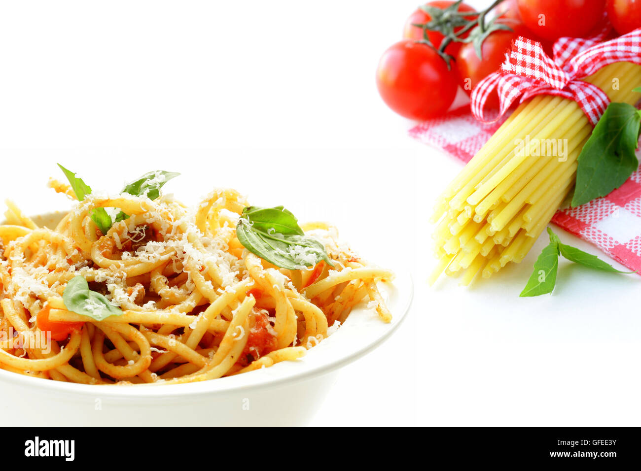Traditional Italian pasta with tomato sauce on a white background Stock
