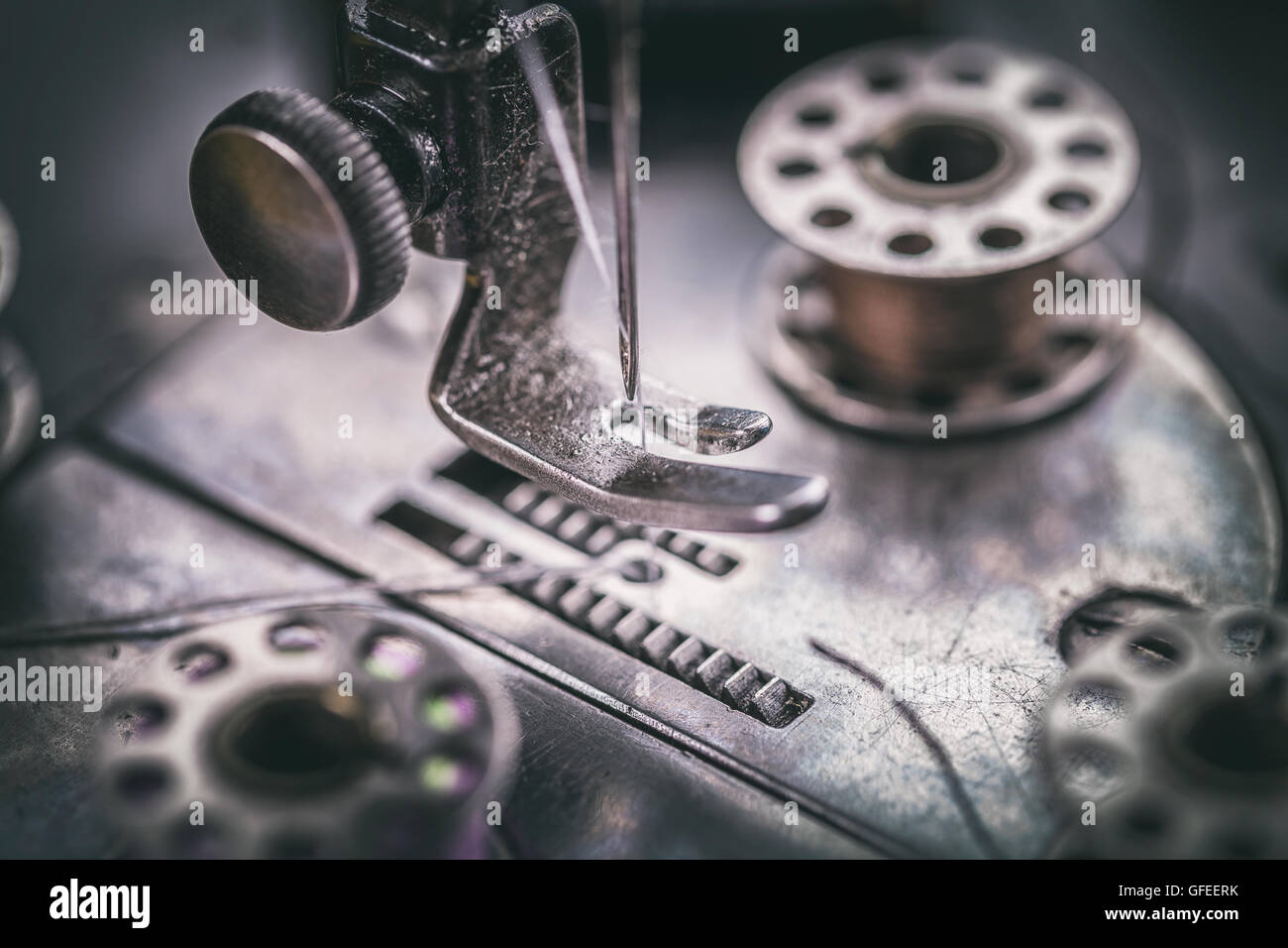 Close up of household sewing machine presser foot Stock Photo