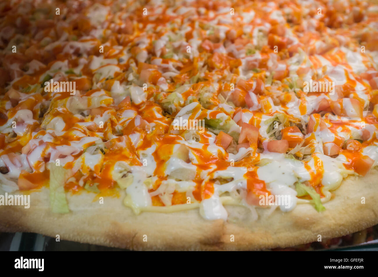 Large slices of ranch taco cheese pizza New York style Stock Photo Alamy
