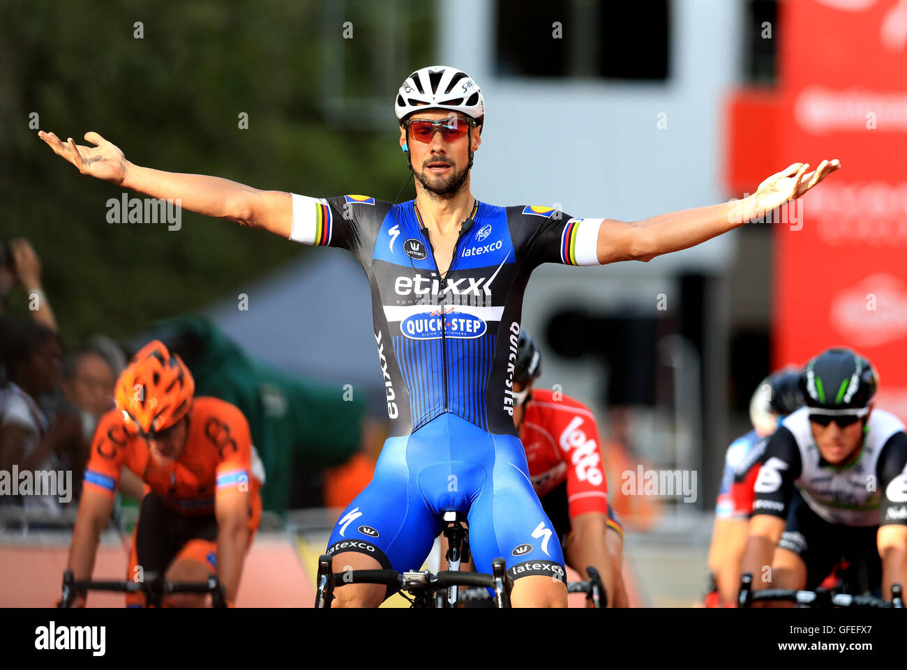 Tom Boonen from Etixx ??? Quick-Step crosses the line to win the Surrey Classic, during day two of Prudential RideLondon. Stock Photo
