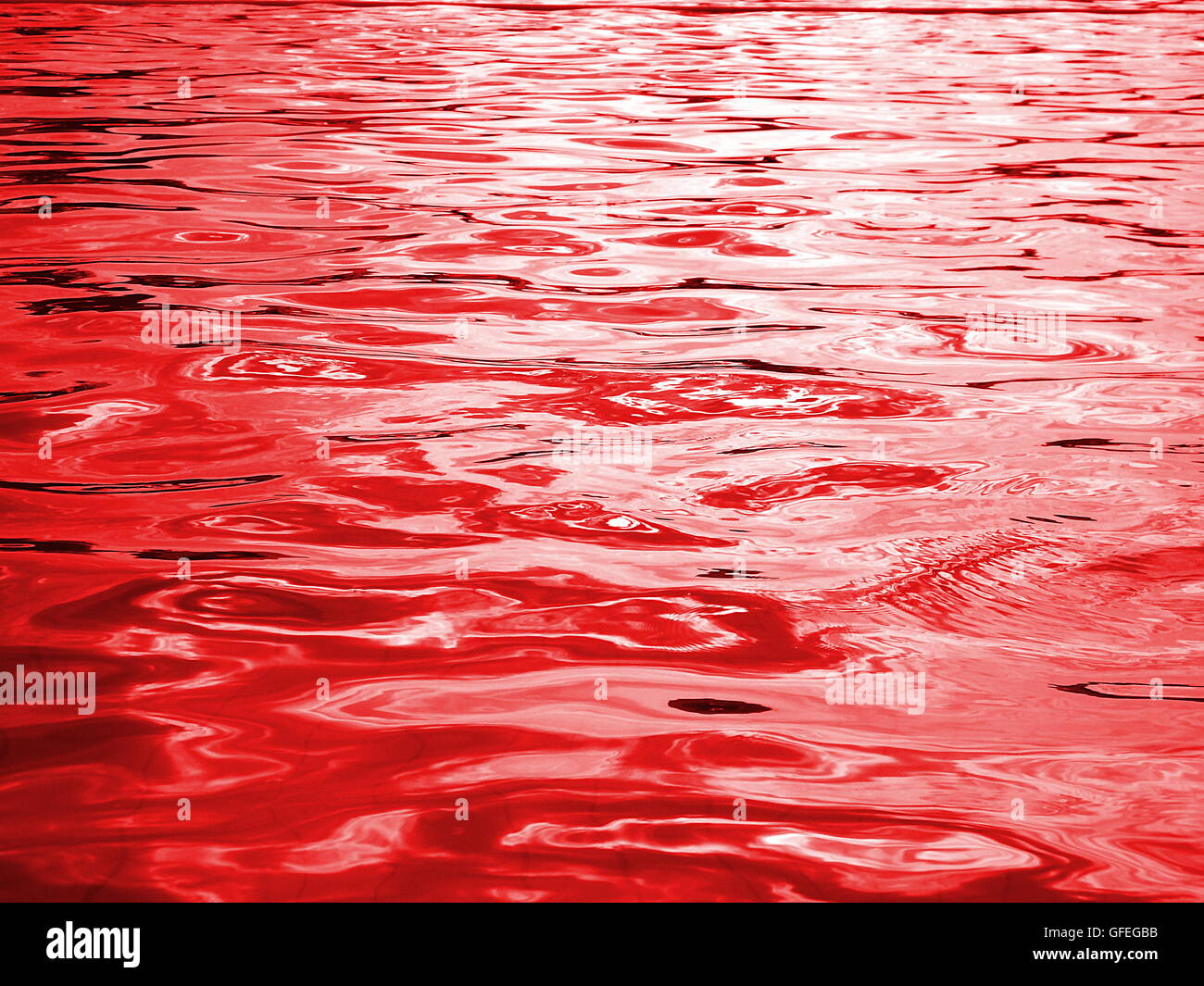 https://c8.alamy.com/comp/GFEGBB/reflection-of-light-on-the-waves-red-water-and-light-from-the-sun-GFEGBB.jpg
