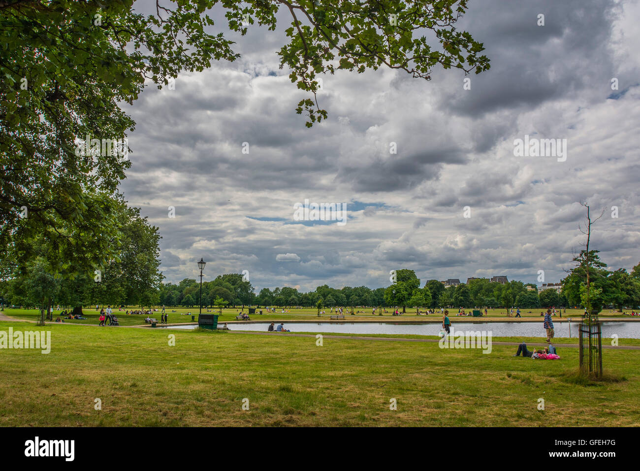 A cloudy summer’s Sunday afternoon on Clapham Common, South London Stock Photo