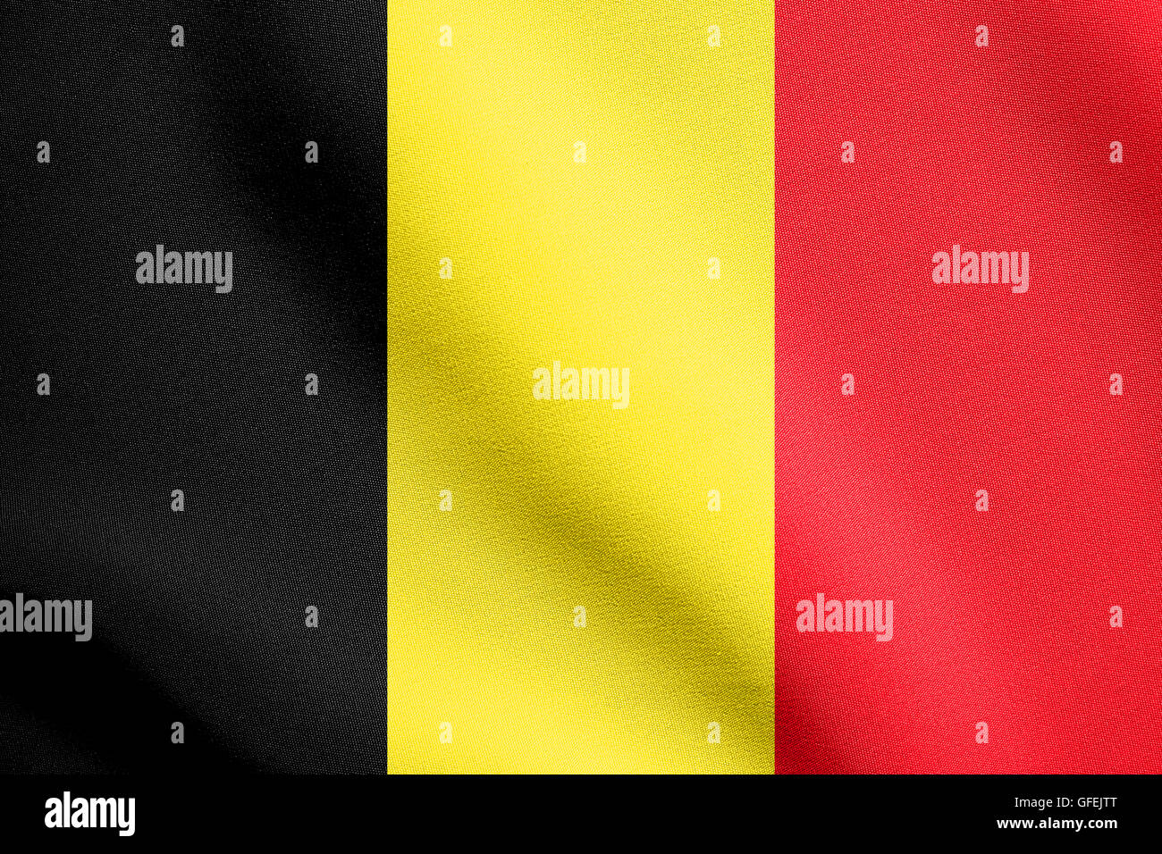 Flag of Belgium waving in the wind with detailed fabric texture. Belgian national flag. Stock Photo