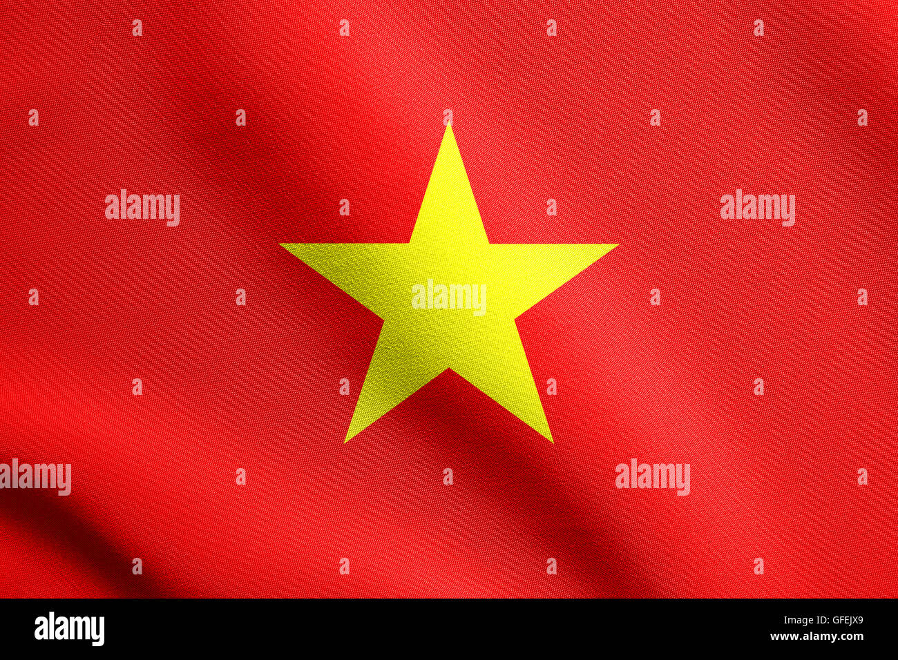 Flag of Vietnam waving in the wind with detailed fabric texture. Vietnamese national flag. Stock Photo