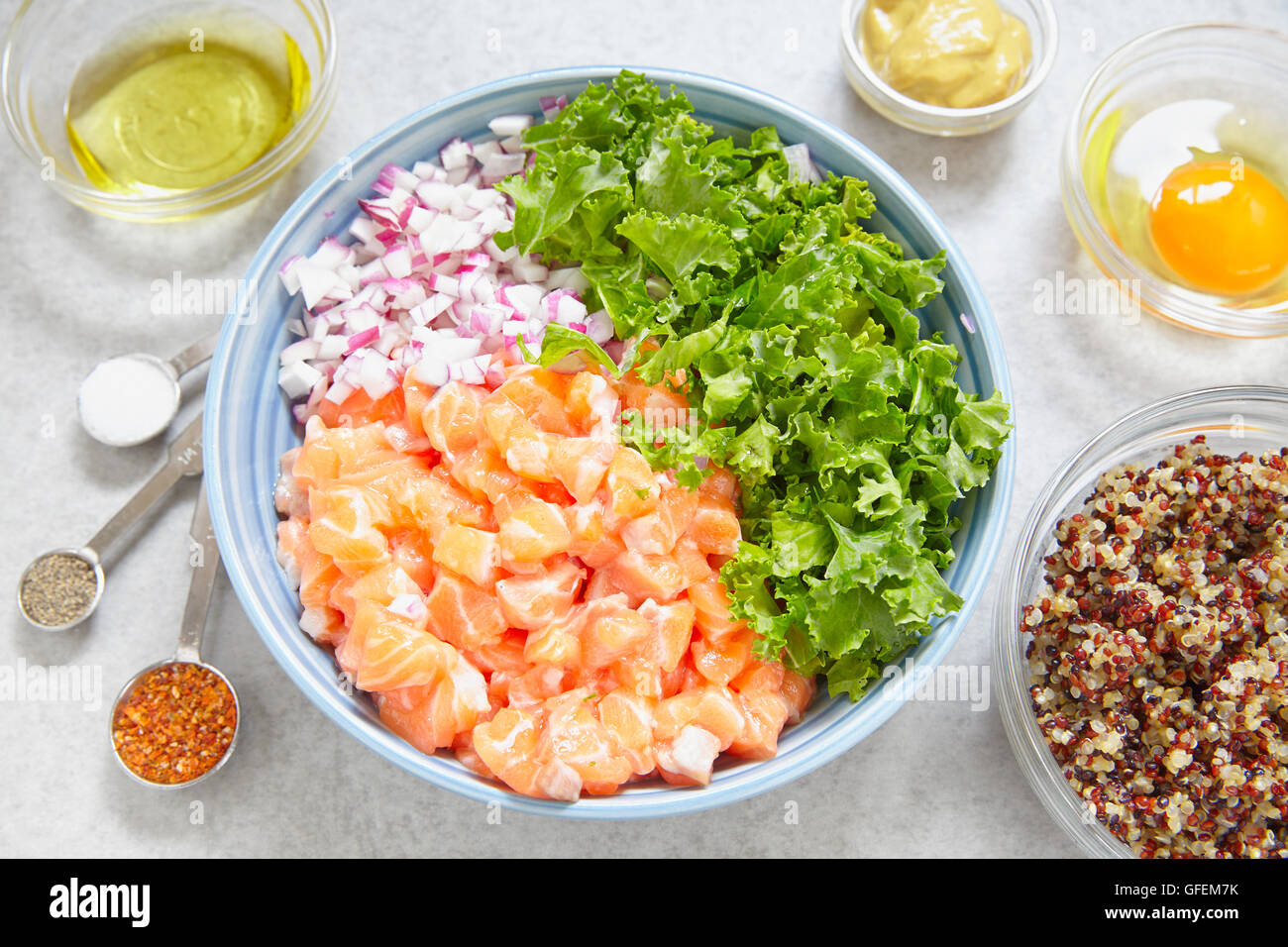 Healthy salmon quinoa kale burger ingridients on a table Stock Photo