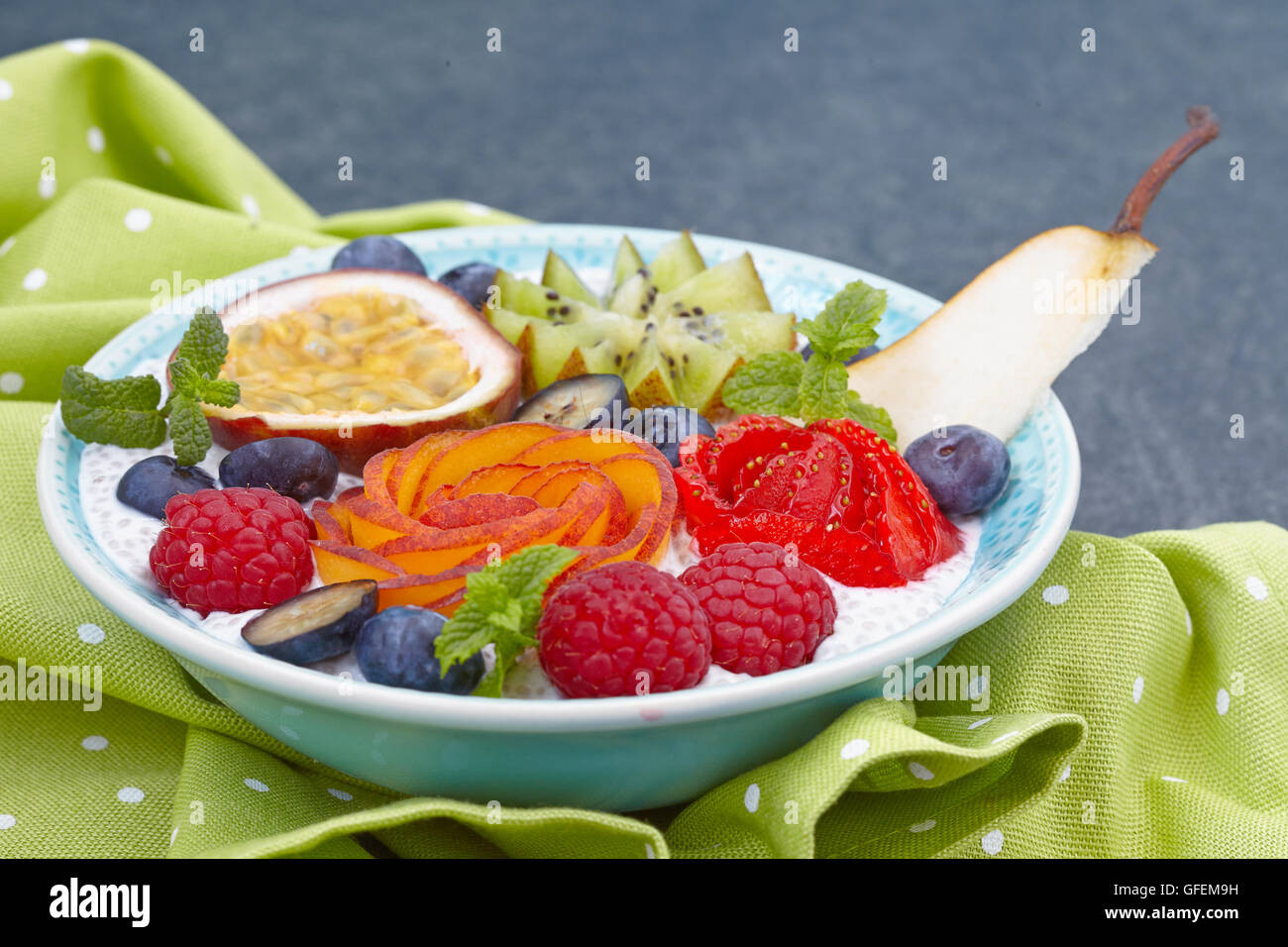 Chia seed pudding decorated with fruits and berries Stock Photo