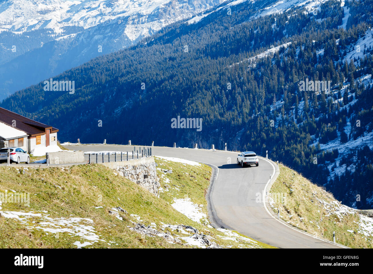 Image of a car driving on a mountain road Stock Photo