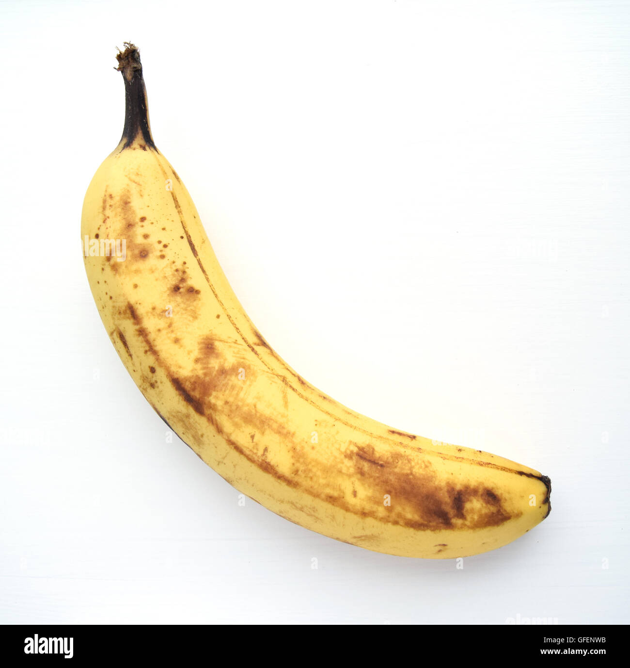 Overripe banana ready to eat, isolated on white background Stock Photo ...