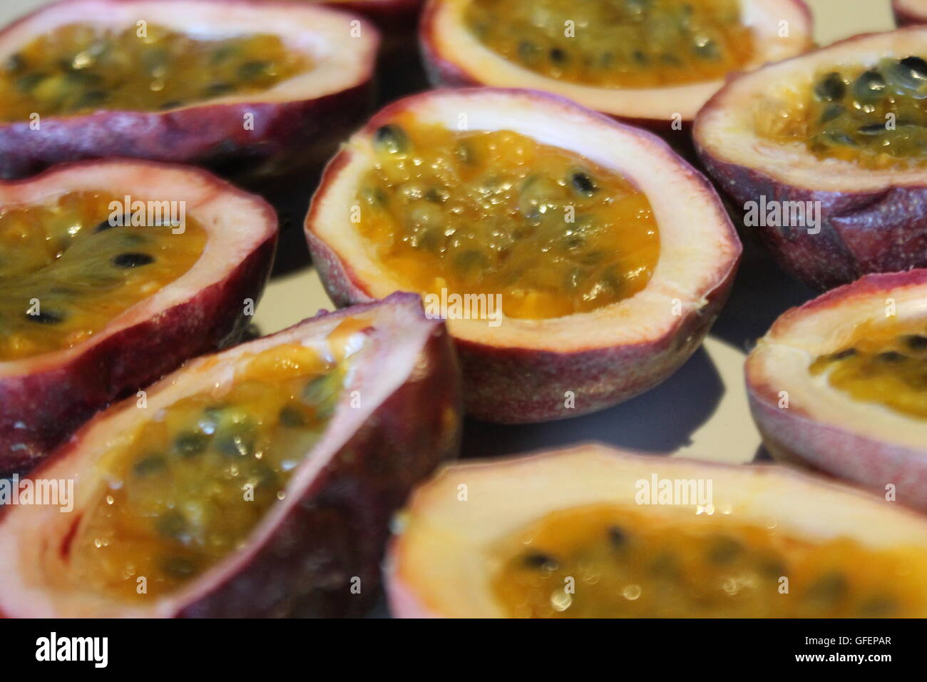Passion fruit open cut in half maracuya Stock Photo