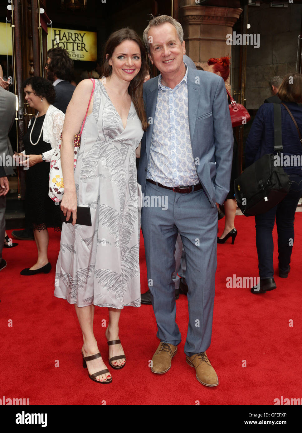Frank Skinner and girlfriend Cath Mason arriving for the opening gala performance of Harry Potter and The Cursed Child, at the Palace Theatre in London. Stock Photo