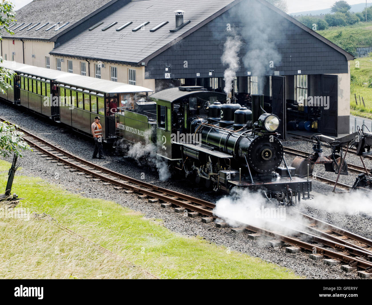 Steam train waiting at Pant station on the Brecon Mountain Railway near Merthyr Tydfil in South Wales. Stock Photo
