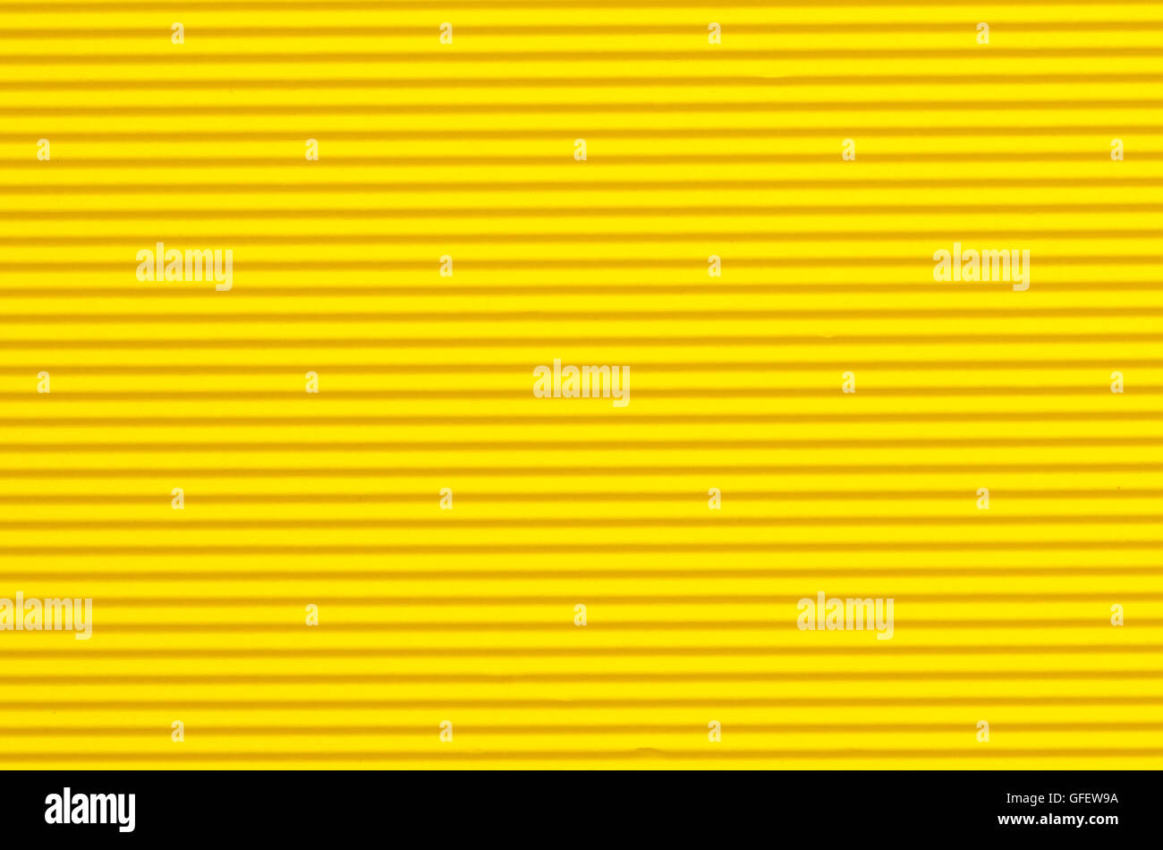 corrugated yellow color paper background texture Stock Photo
