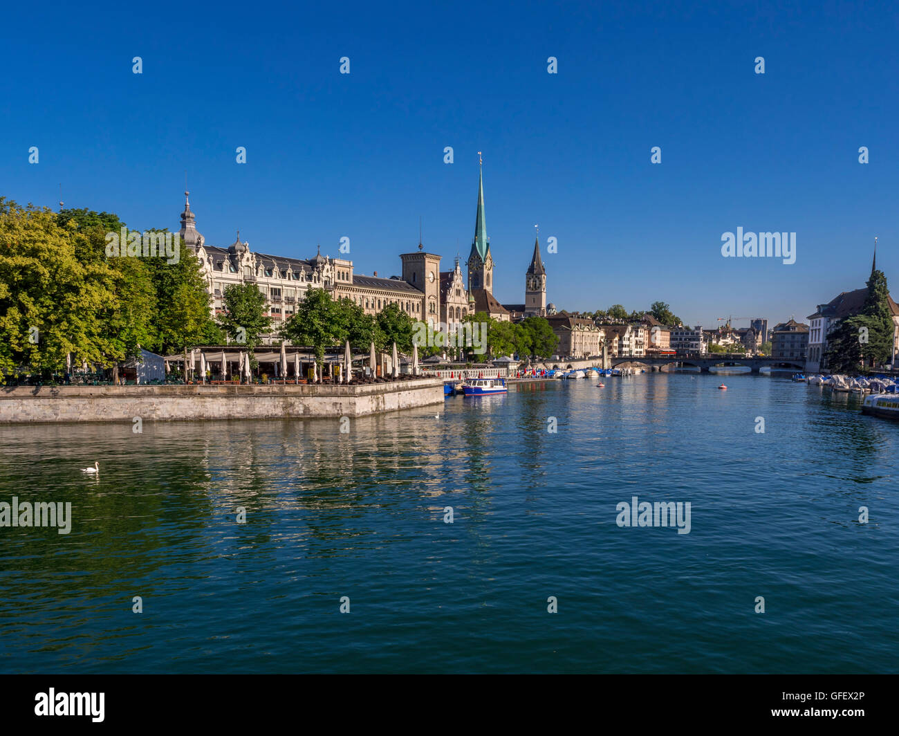 View of Zurich, Limmat river and the churches Frauenmunster, and St. Peter, Switzerland, Europe Stock Photo