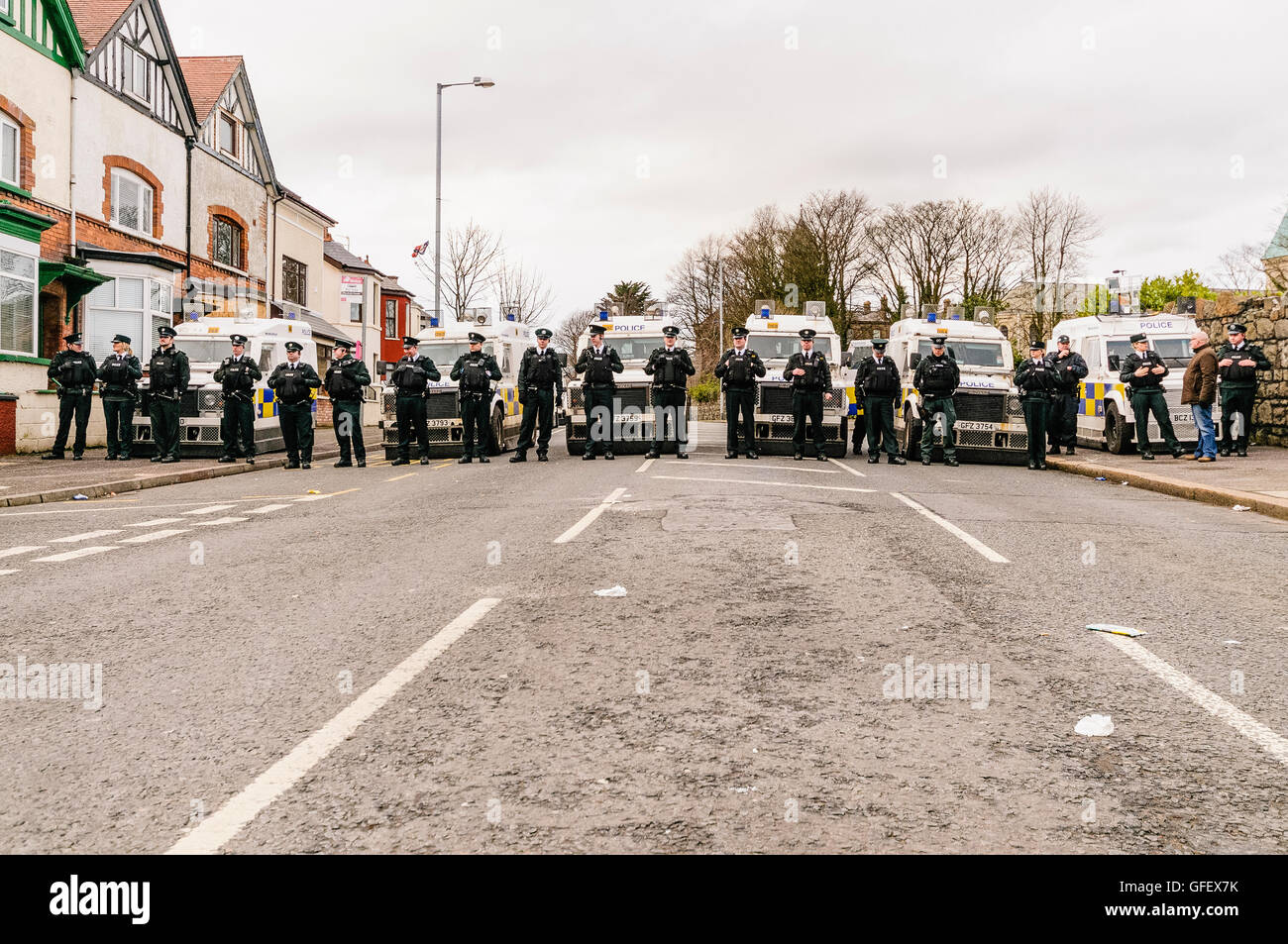 Belfast, Northern Ireland. 1st March 2014 - PSNI form a line across the Woodvale Road to prevent the passage of a loyalist orange order parade Stock Photo