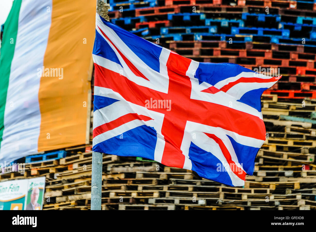 Newtownabbey, Northern Ireland. 11 July 2014 - Bonfires are prepared for burning for 11th July celebrations, many being adorned with election posters from hated politicians, or large banners with political messages. Stock Photo