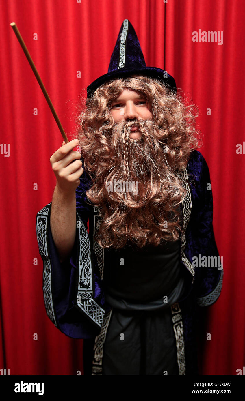 Harry Potter enthusiast James Vaudrey dresses as the character Dumbledore at an event to mark the launch of Harry Potter and the Cursed Child at Foyles book shop in London, as fans across the globe wait to find out what happens next to Potter and his friends following the play's official West End opening. Stock Photo