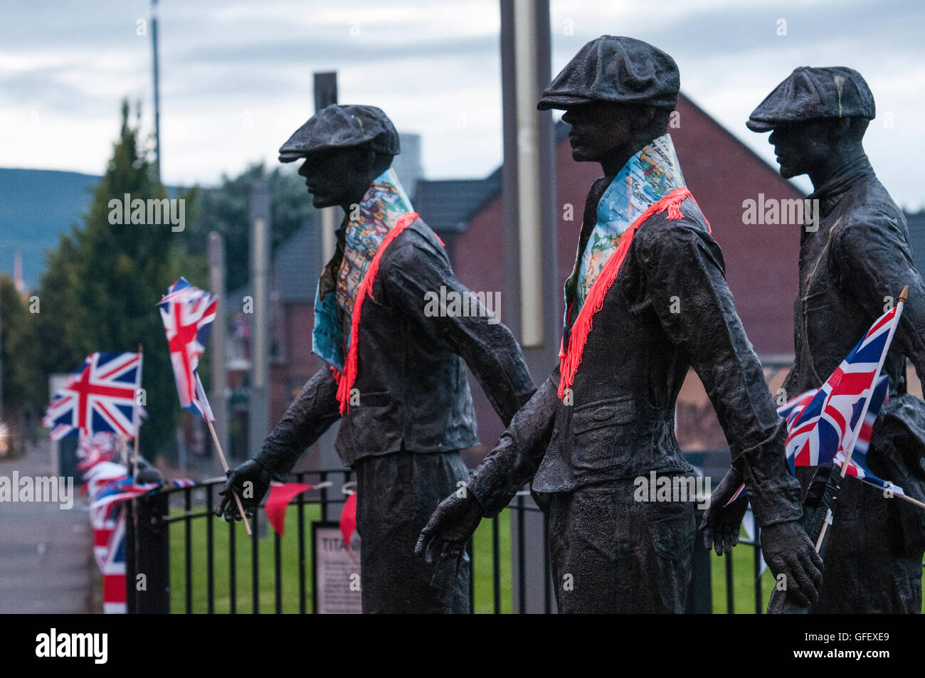 Belfast, Northern Ireland. 11 Jul 2016 - A public art display remembering the shipyard workers of Belfast is decorated with Orange "Sashes" or collarettes and Union Flags in readiness for the 12th July celebrations Stock Photo