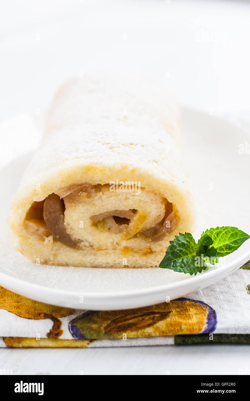 roulade with pear filling, mint and cup Stock Photo - Alamy