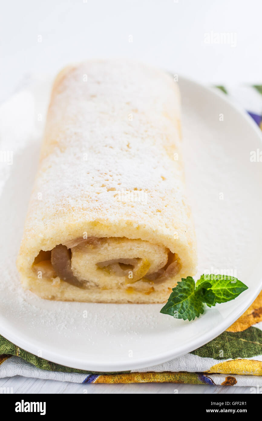 roulade with pear filling, mint and cup Stock Photo - Alamy
