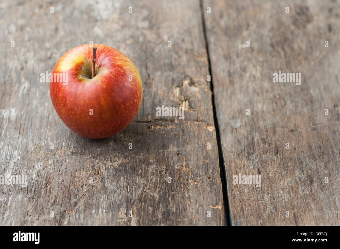 red apples on wooden rustic background Stock Photo - Alamy