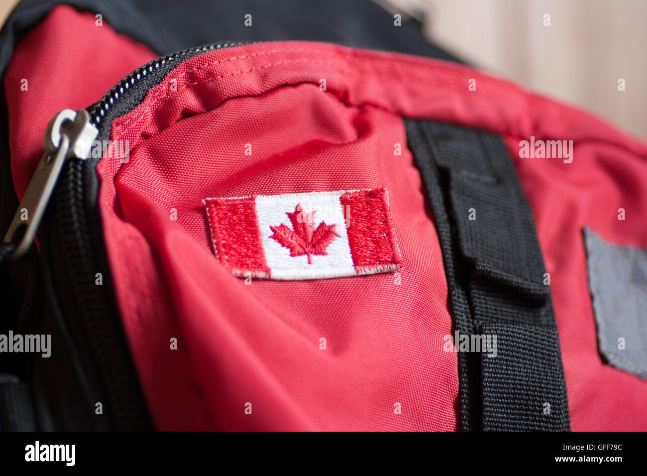 Canadian flag on the red backpack Stock Photo Alamy