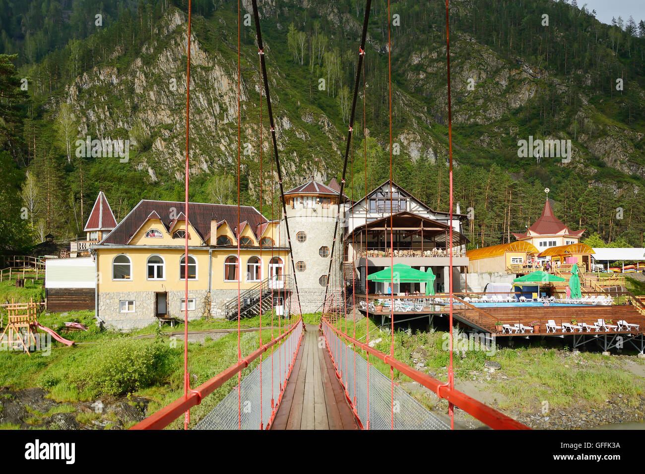 Tourist base in the Altai mountains, the view from the pedestrian bridge over the Katun river Stock Photo