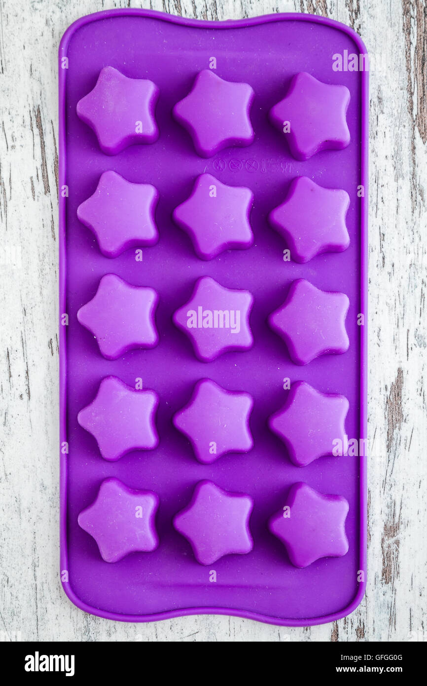 Empty purple silicon mold for making chocolate Stock Photo Alamy