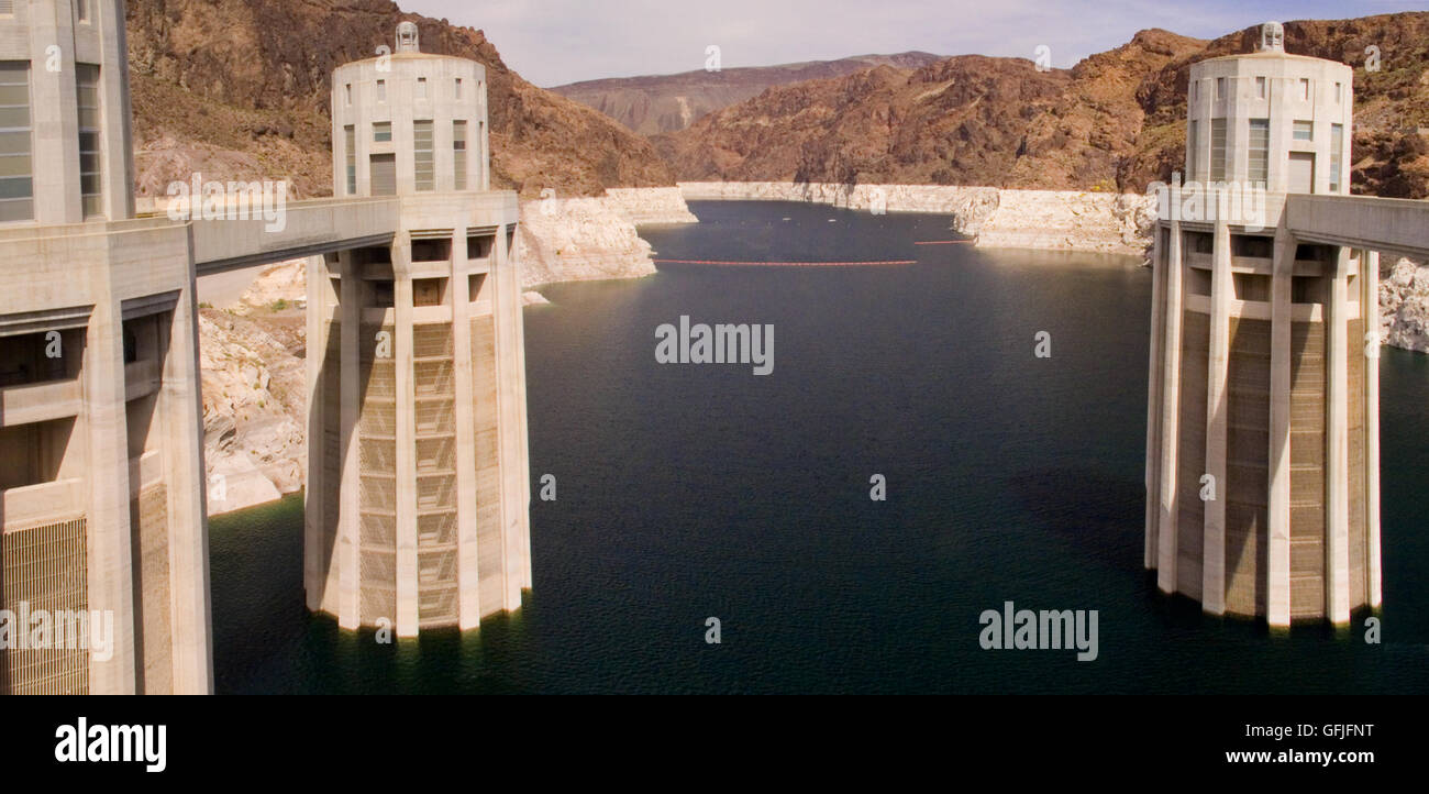 A panoramic view of the upstream side Hoover Dam, showing the Penstock Towers. Stock Photo