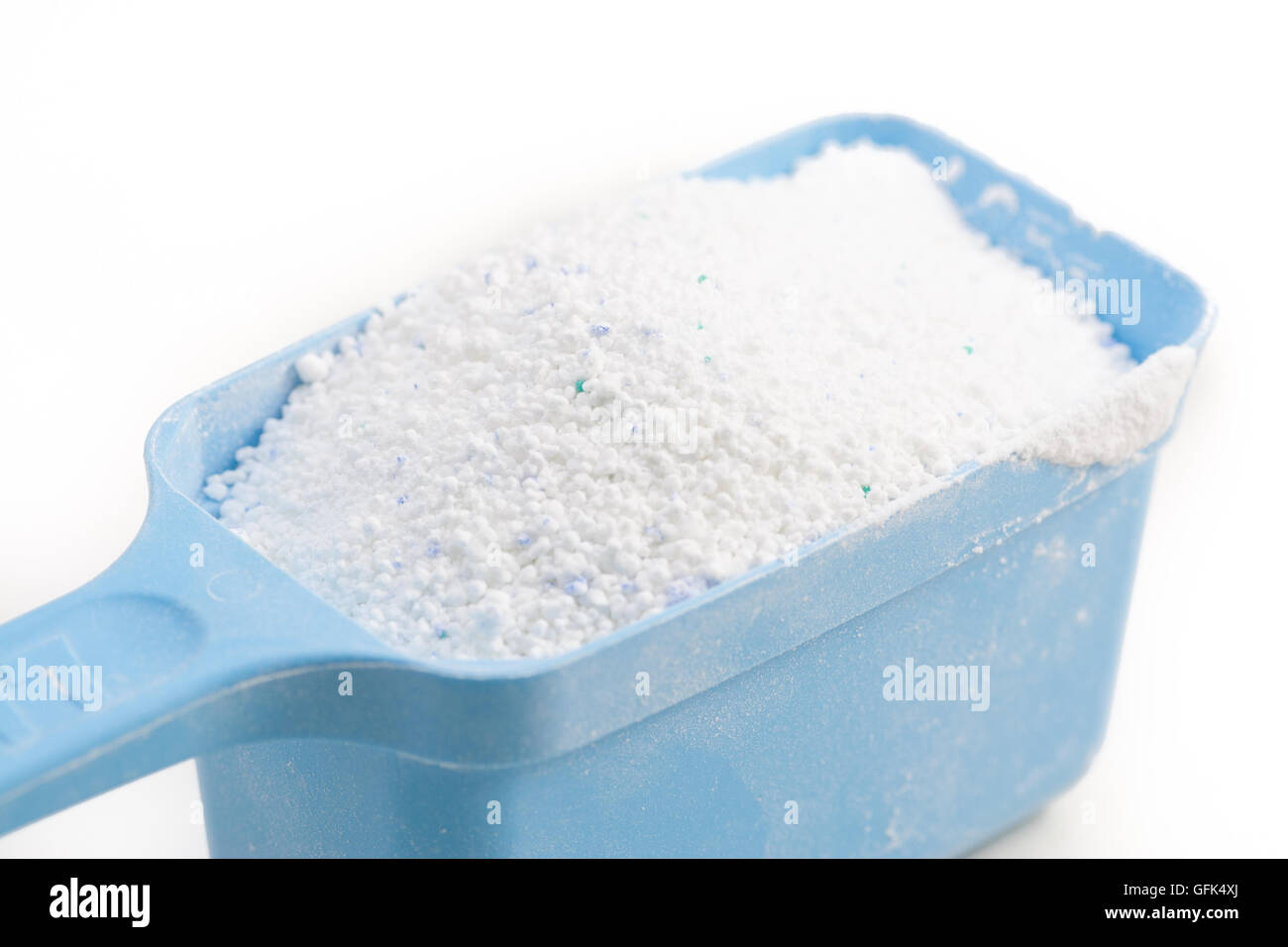 Laundry Detergent Or Washing Powder In A Blue Measuring Cup On A Kitchen  Counter Top Stock Photo, Picture and Royalty Free Image. Image 22949907.