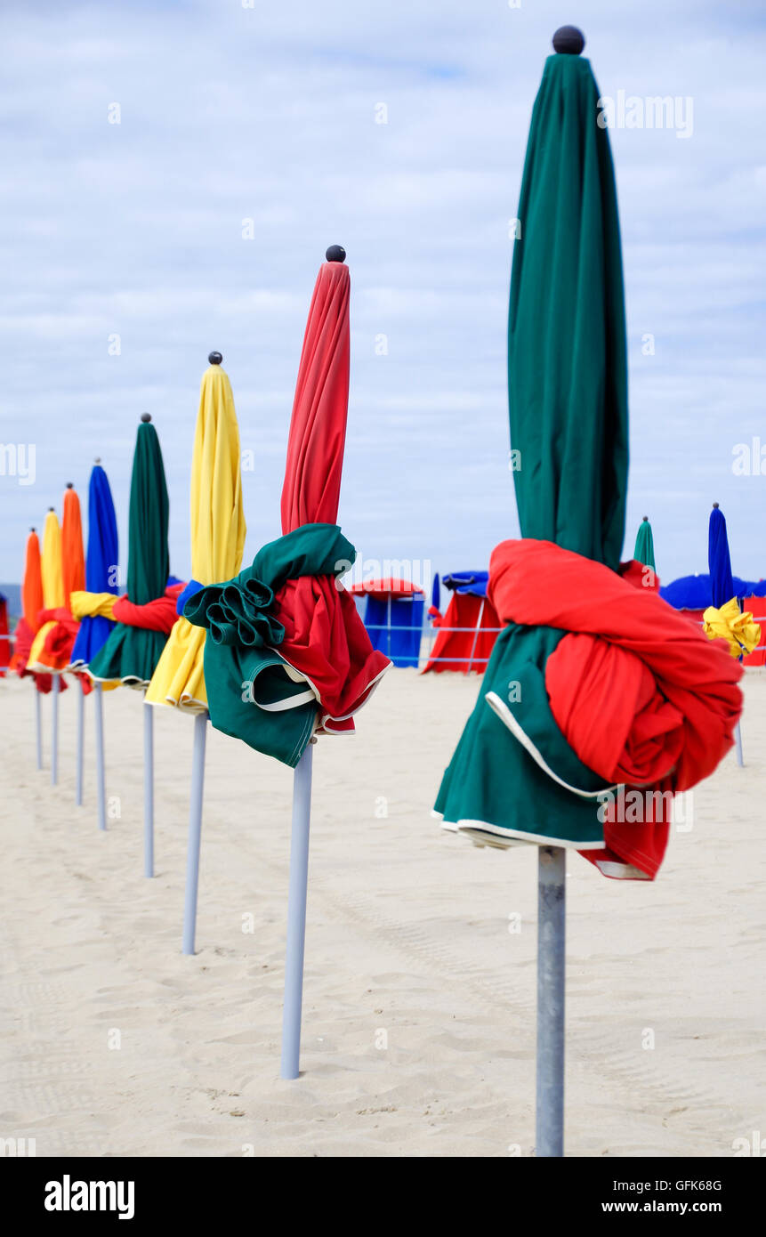 Colourful Beach Umbrellas On The Famous Beach Of Deauville In France Colourful Beach Umbrellas On The Famous Beach Of Deauville In France