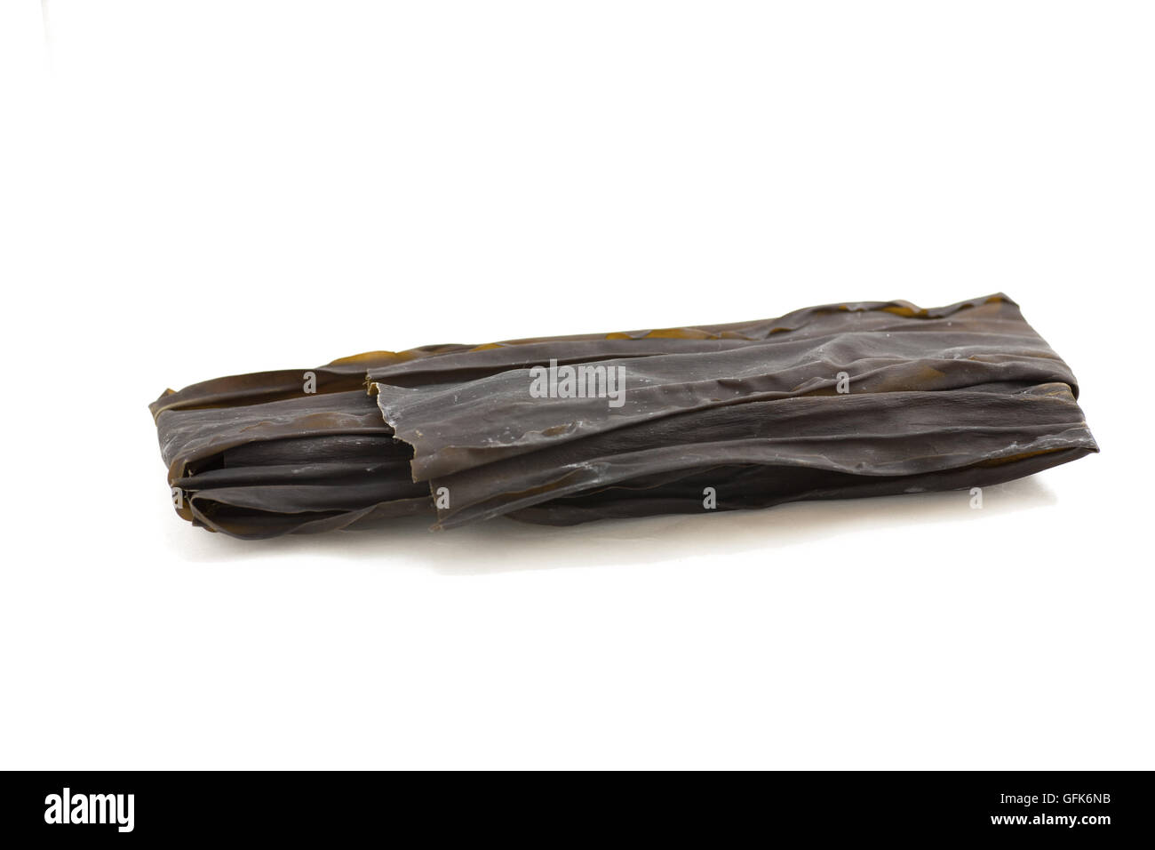 Japanese dried seaweed called Konbu or Kombu on white isolated