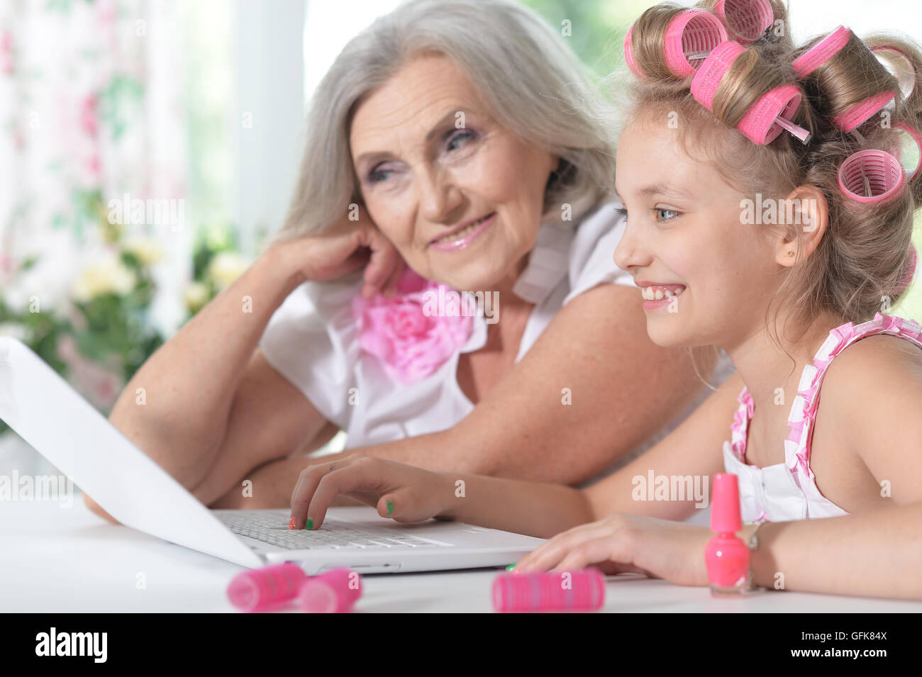 little girl with granny using laptop Stock Photo - Alamy
