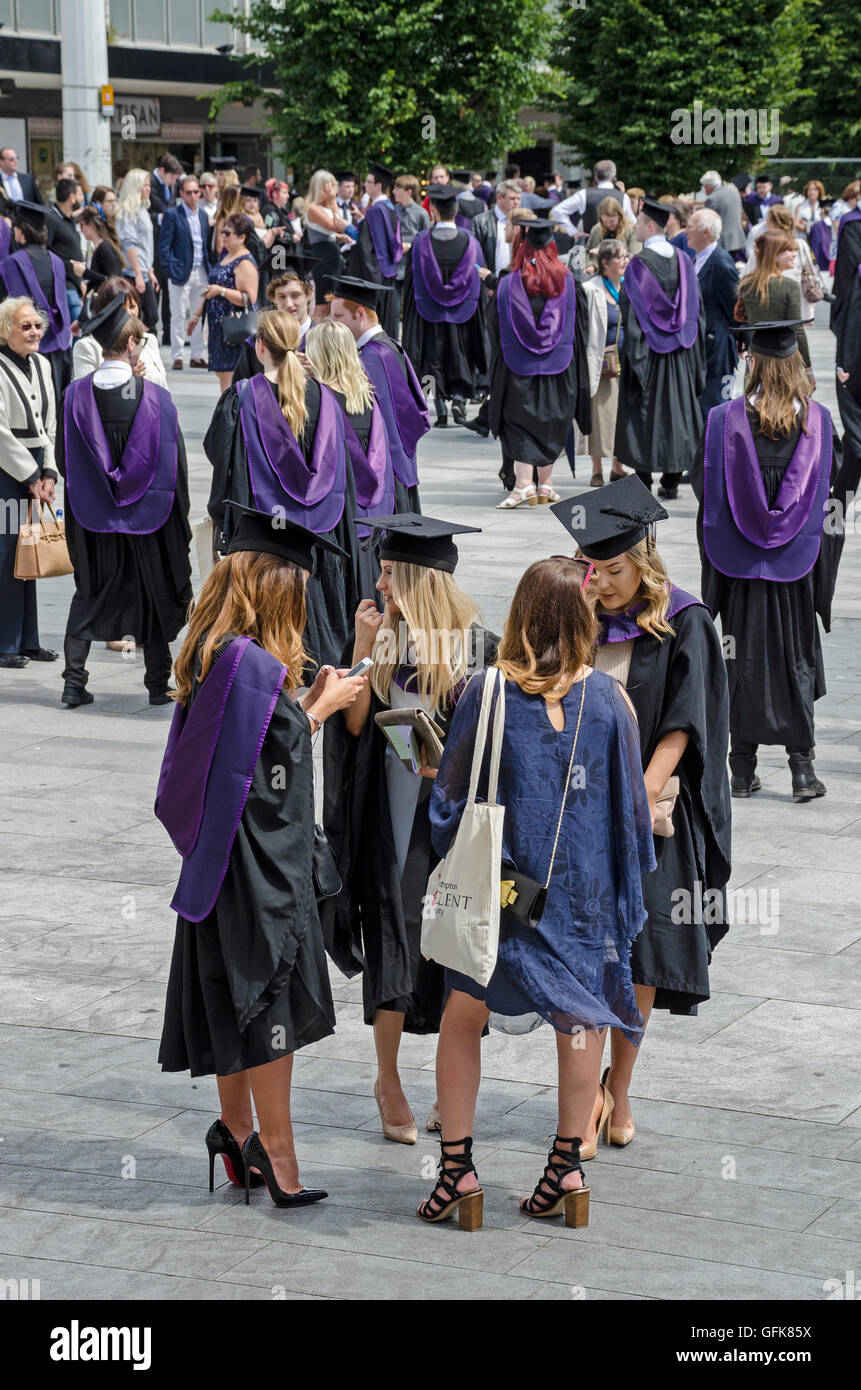 solent university graduation day in the guildhall square southampton, graduates will robes on. Stock Photo