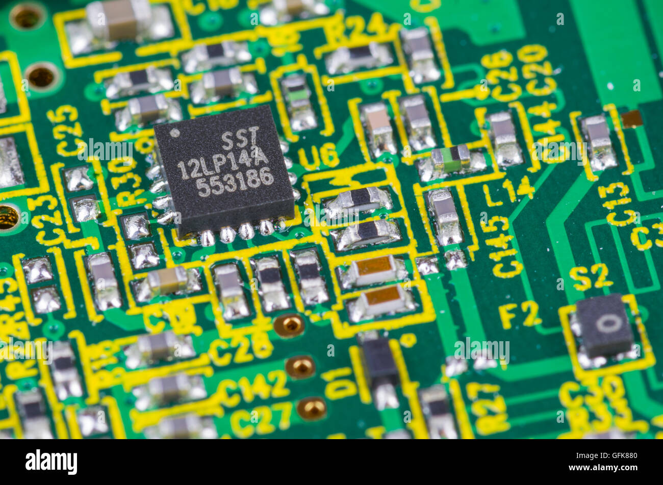 SST microchip on an electronics printed circuit board. Stock Photo