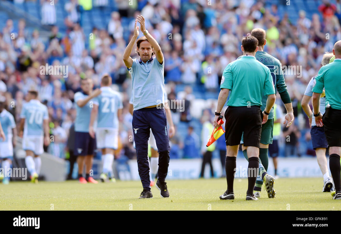 Lazio manager Simone Inzaghi applauds their fans during the Friendly match between Brighton and Hove Albion and Lazio at the American Express Community Stadium in Brighton and Hove. July 31, 2016. Stock Photo