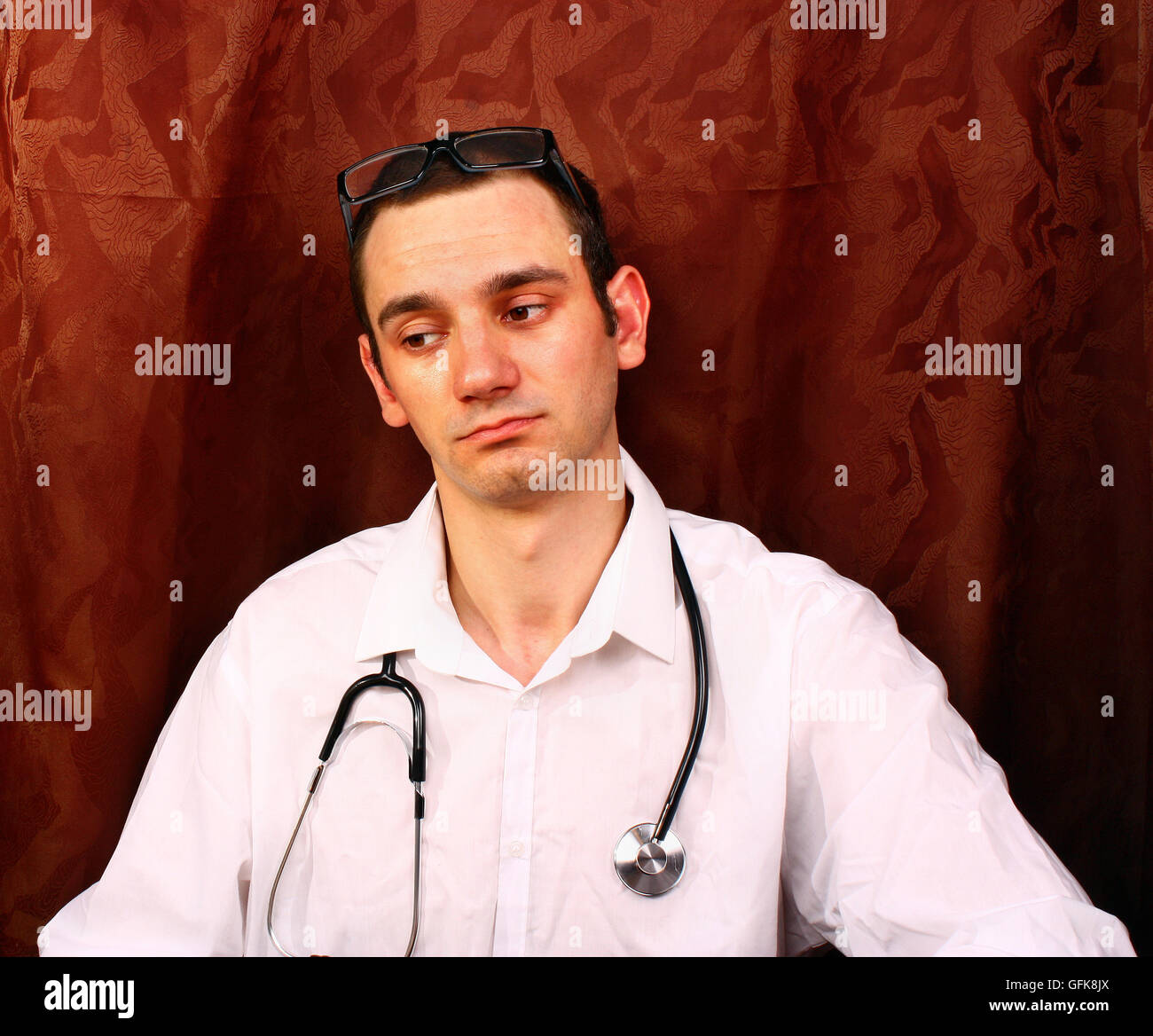 Young unshaven male doctor hi-res stock photography and images - Alamy